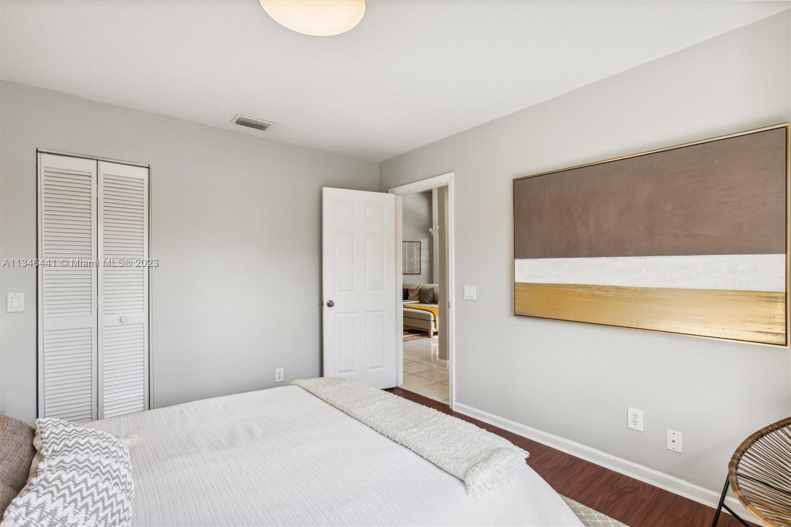 2883 Oakbrook Drive Weston, FL 33332 - Photo 41 of 74 a bedroom with a bed and a granite top