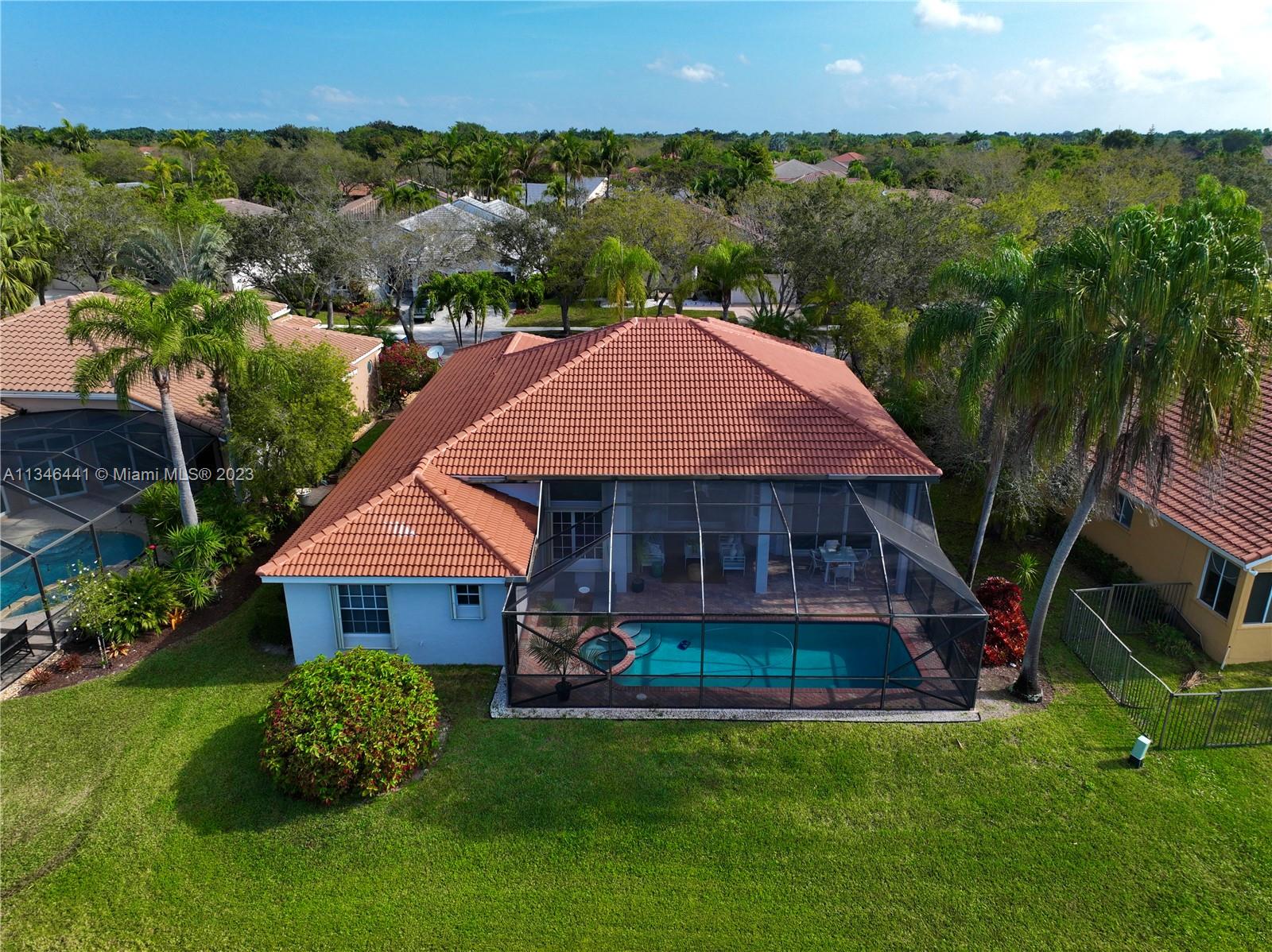 2883 Oakbrook Drive Weston, FL 33332 - Photo 61 of 74 an aerial view of a house
