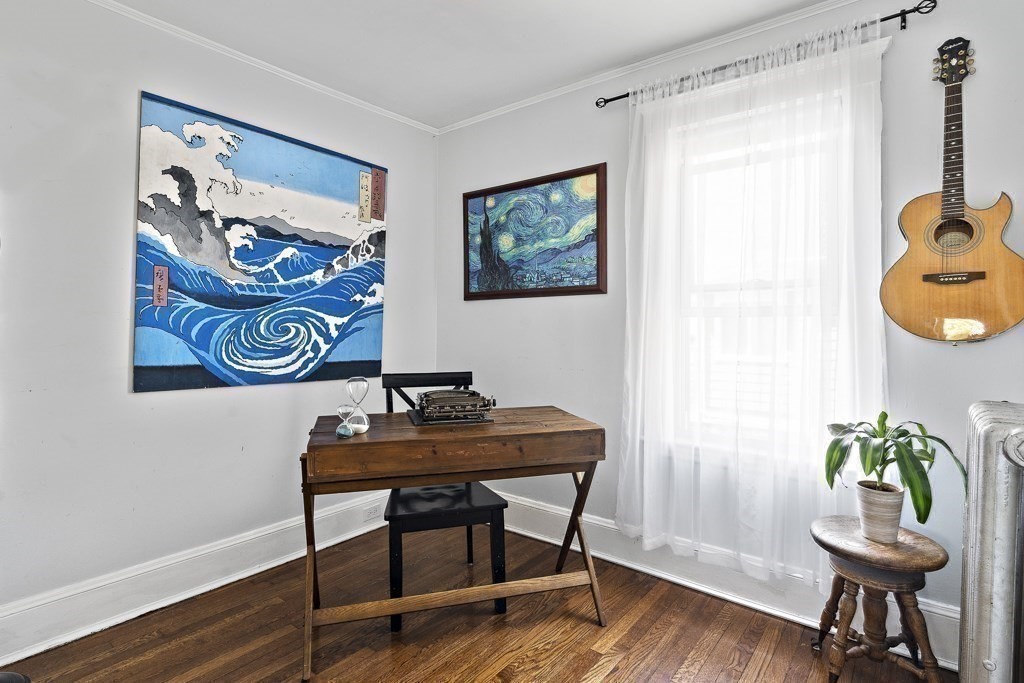98 Summit Street Weymouth, MA 02188 - Photo 15 of 31 a workspace with furniture and wooden floor