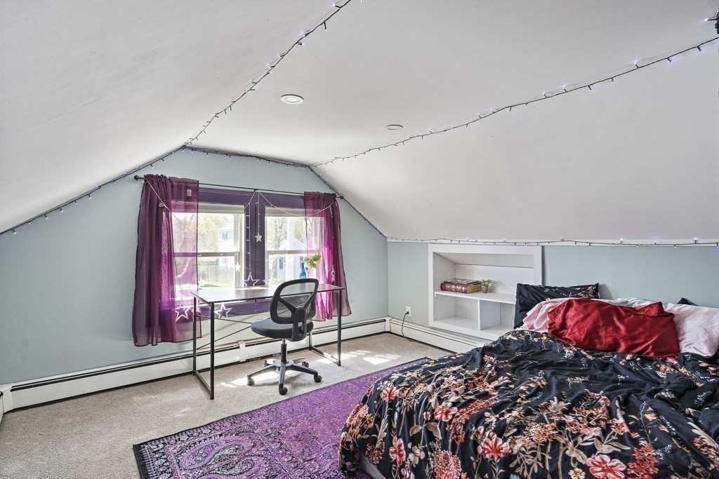 98 Summit Street Weymouth, MA 02188 - Photo 18 of 31 a bed room with a bed and a chair