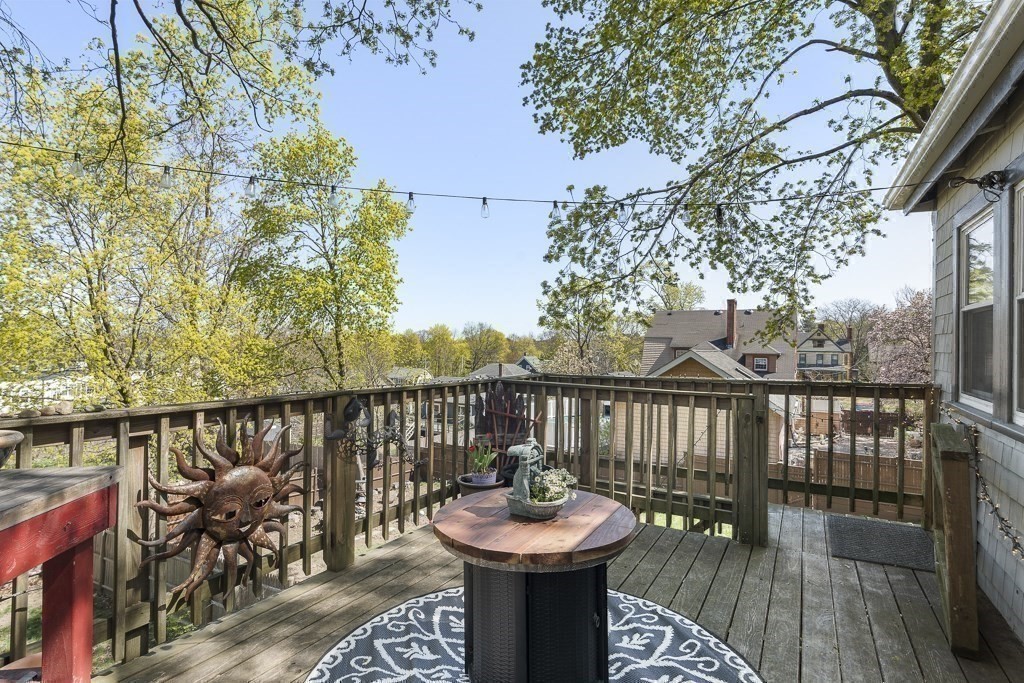 98 Summit Street Weymouth, MA 02188 - Photo 22 of 31 a view of a balcony with two chairs and a potted plant