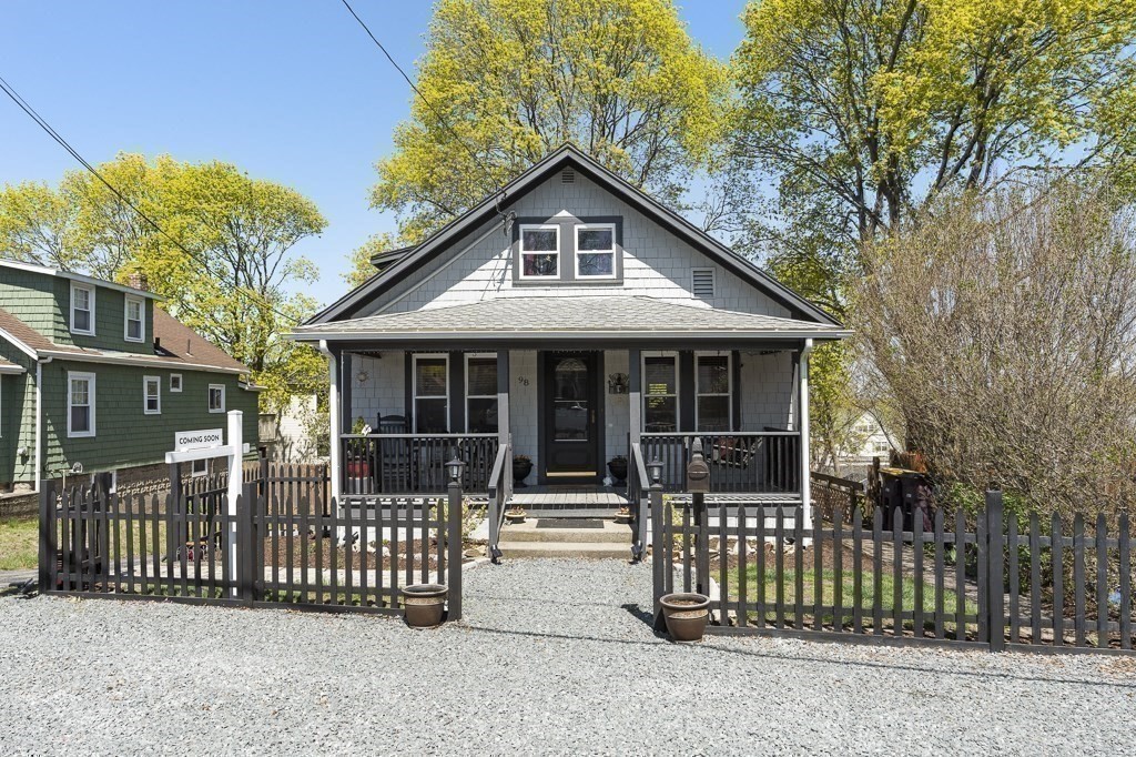 98 Summit Street Weymouth, MA 02188 - Photo 27 of 31 a front view of a house with a garden