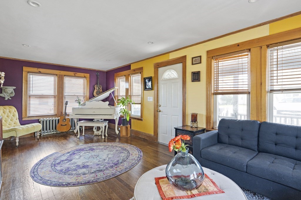 98 Summit Street Weymouth, MA 02188 - Photo 5 of 31 a living room with furniture a rug and a large window