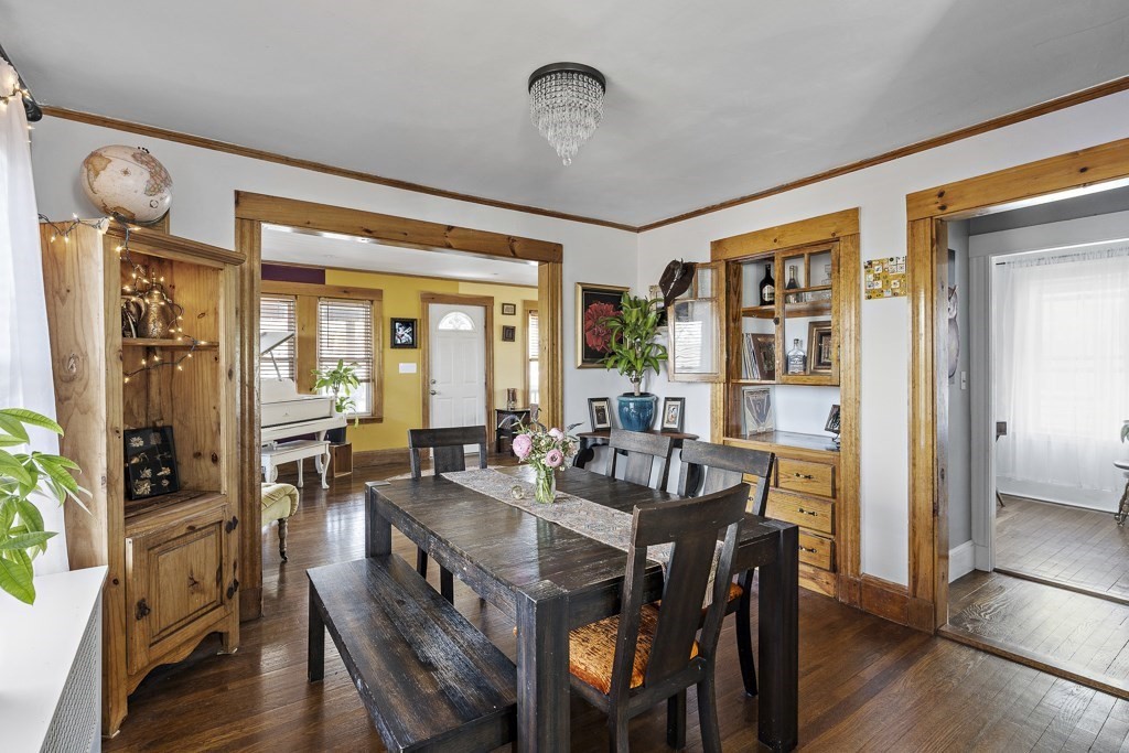 98 Summit Street Weymouth, MA 02188 - Photo 8 of 31 a view of a dining room with furniture window and wooden floor