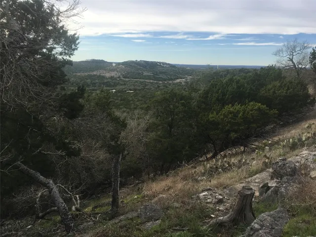 a view of lake with mountain