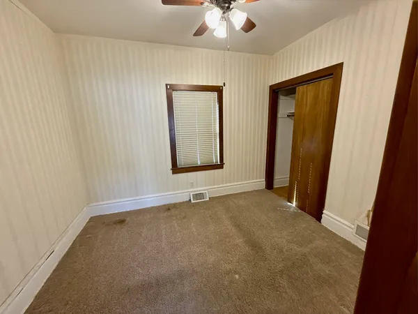 an empty room with a window