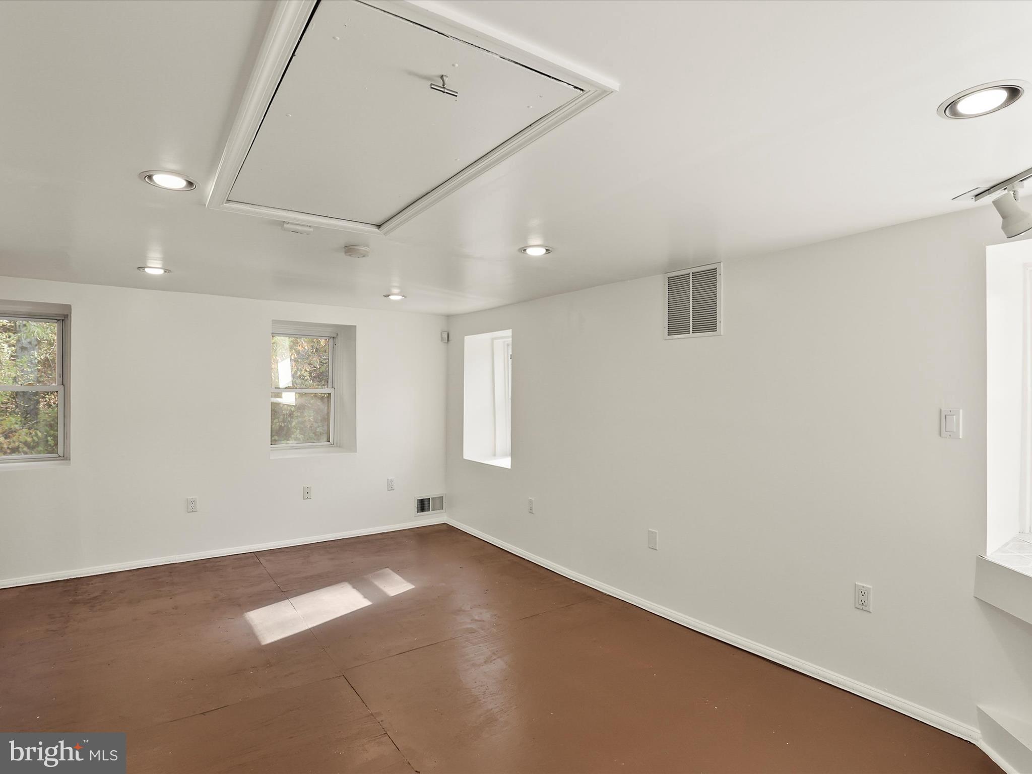 2122 West Springfield Road Seven Valleys, PA 17360 - Photo 40 of 71 an empty room with a empty space and windows