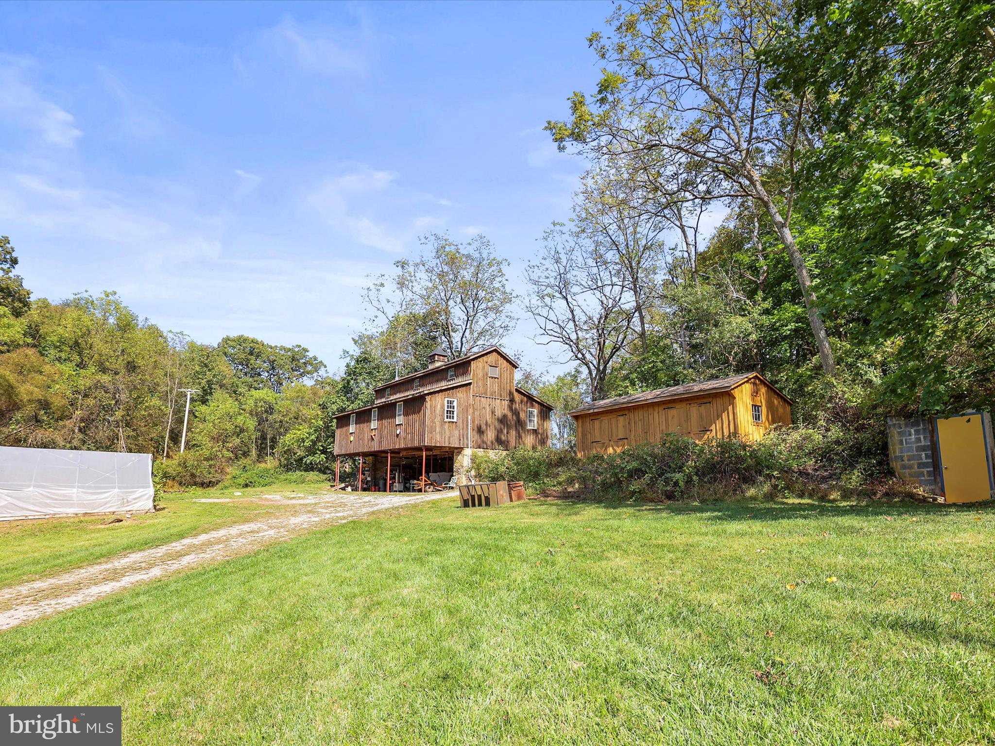 2122 West Springfield Road Seven Valleys, PA 17360 - Photo 47 of 71 a front view of house with yard and trees in the background