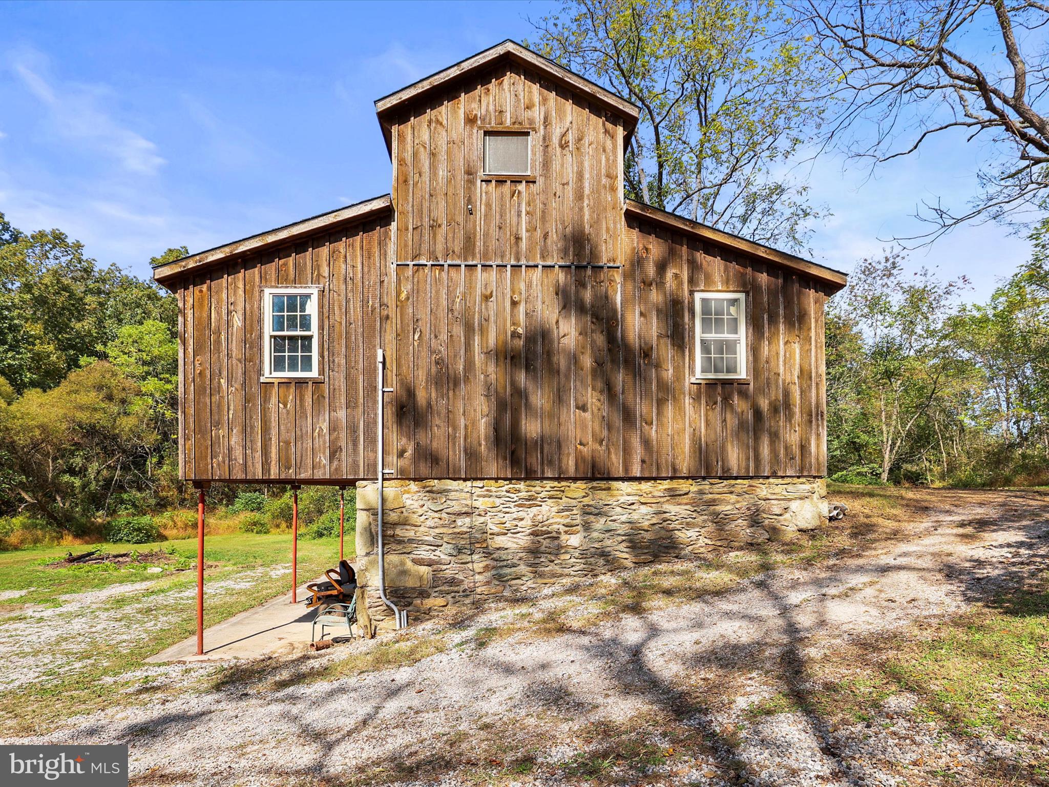 2122 West Springfield Road Seven Valleys, PA 17360 - Photo 48 of 71 a front view of a house with a yard and garage