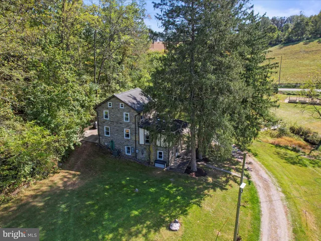 a view of a yard with an outdoor seating