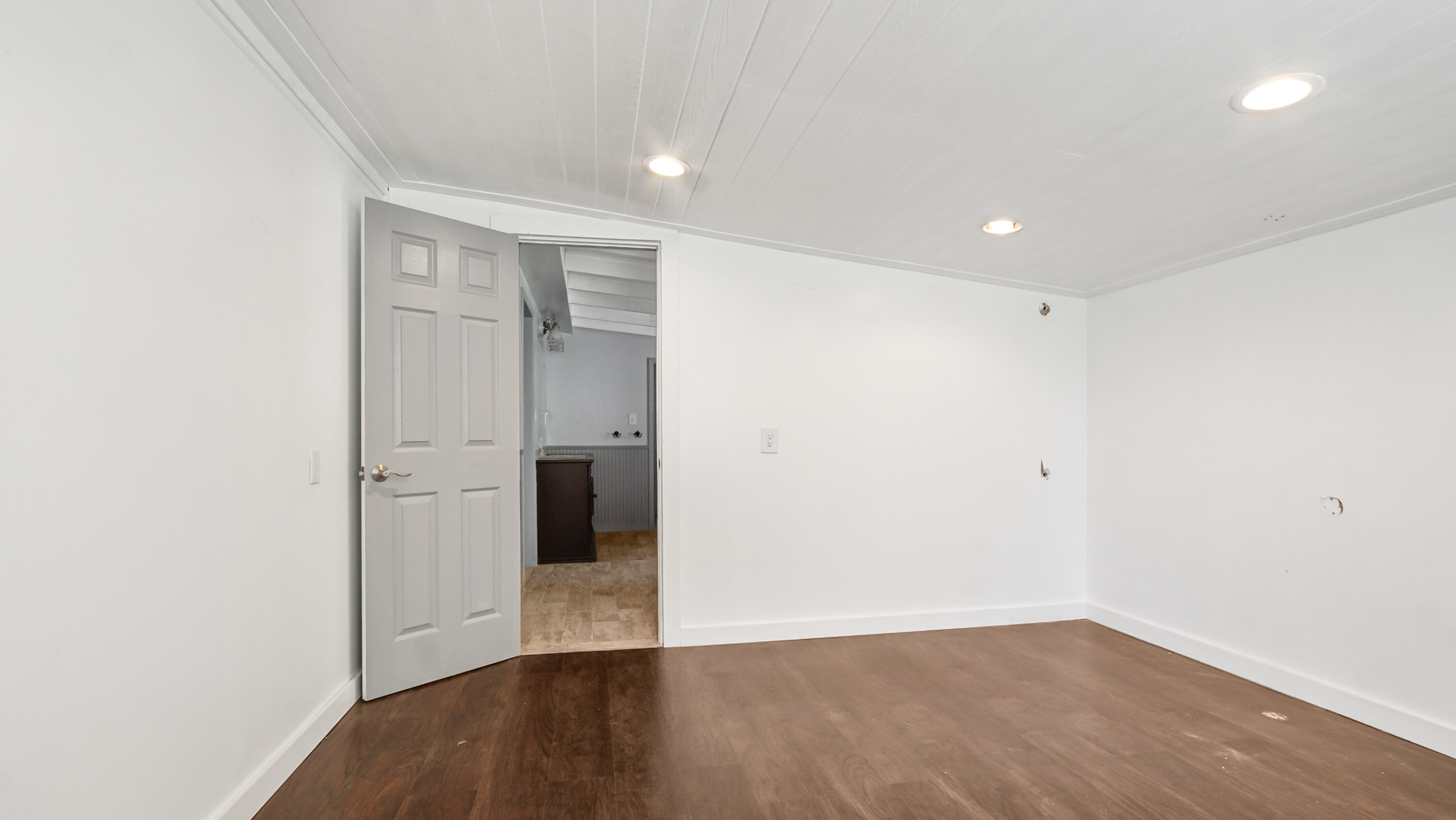 13636 Highway 20 Freeport, FL 32439 - Photo 21 of 42 a view of an empty room with wooden floor