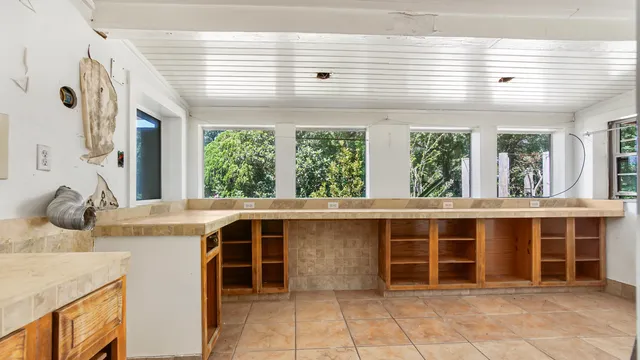 an empty room with windows