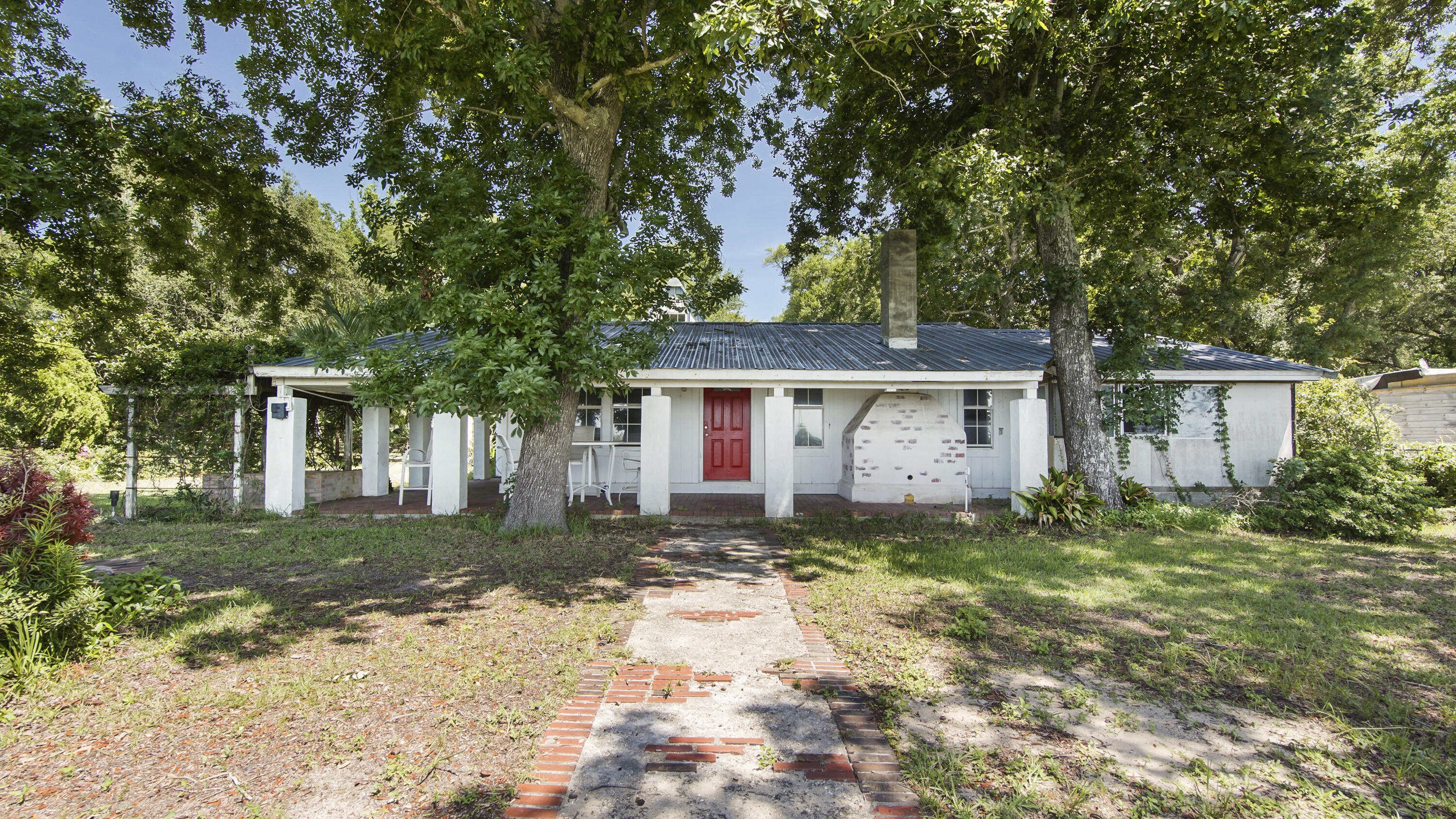 13636 Highway 20 Freeport, FL 32439 - Photo 3 of 42 front view of a house