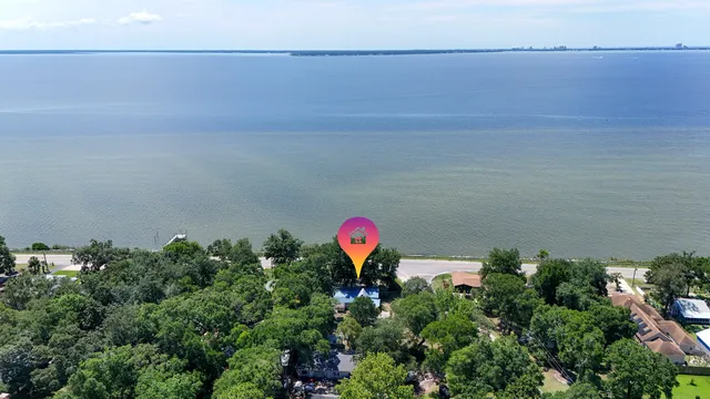a view of a garden with a lake view