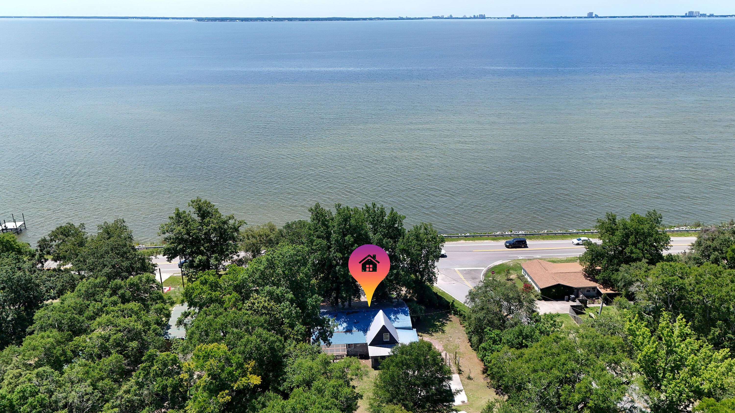 13636 Highway 20 Freeport, FL 32439 - Photo 39 of 42 a aerial view of a house with a yard and balcony