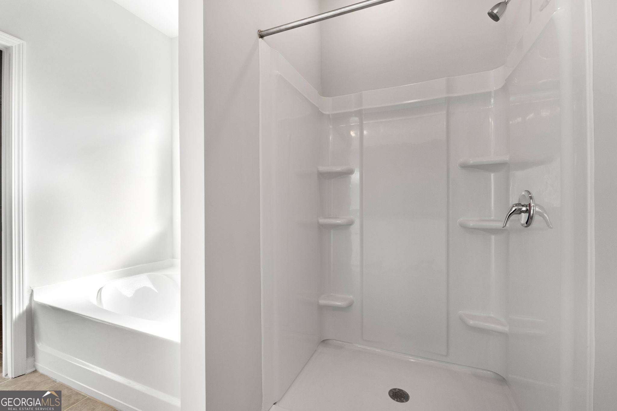 156 Charlie Fuller Road Grantville, GA 30220 - Photo 22 of 36 a bathroom with a bathtub