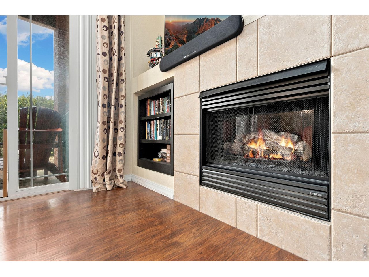 2133 Krisron Road, Unit 101 Fort Collins, CO 80525 - Photo 8 of 30 Gas Fireplace with tile surround