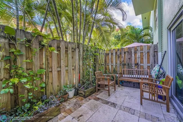 a view of balcony with furniture