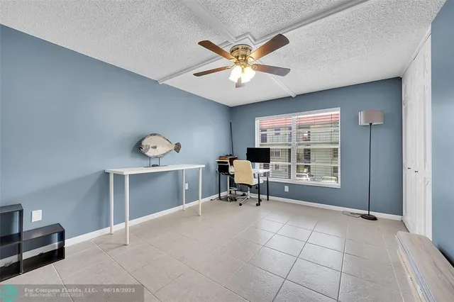 a swimming pool with outdoor seating and yard