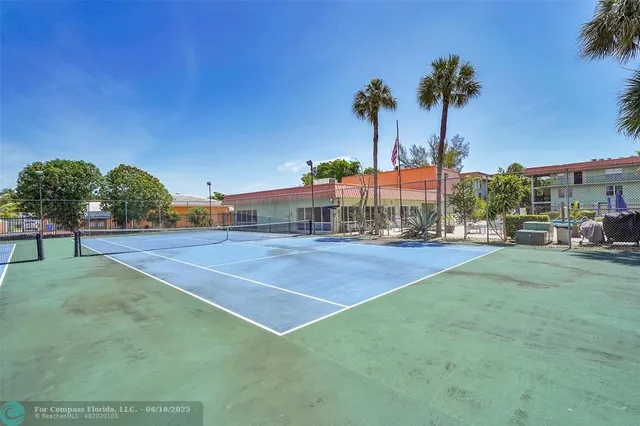 a view of a street with cars