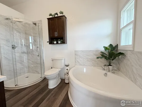 a bathroom with a bathtub sink and toilet