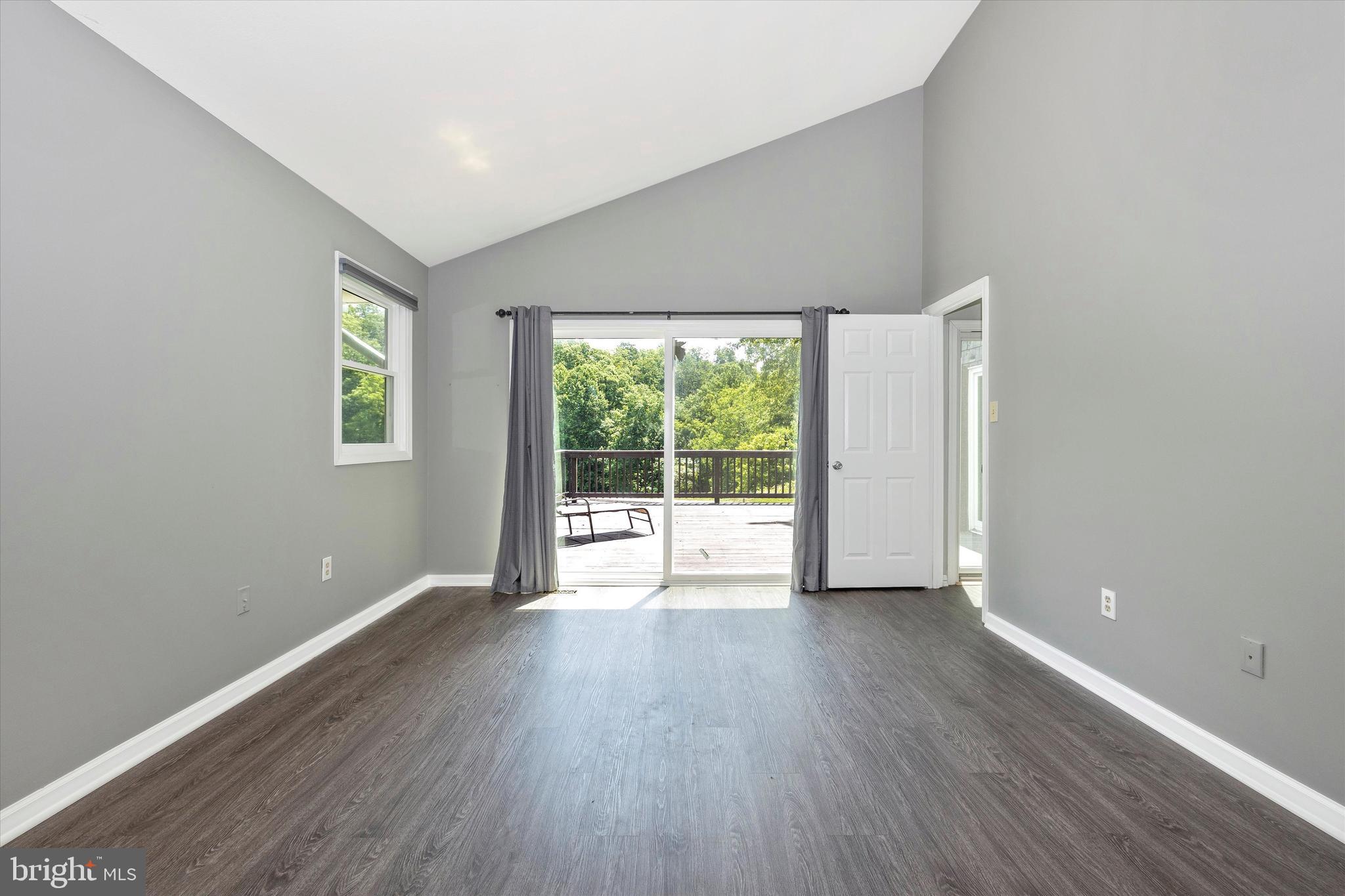 6901 Meadowlake Road New Market, MD 21774 - Photo 13 of 38 Main Level Primary Suite with Deck Access