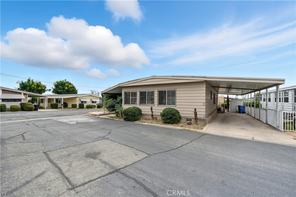 9800 Base Line Road, Unit 79 Rancho Cucamonga, CA 91701 - Photo 2 of 31 a view of house with outdoor space and sitting area