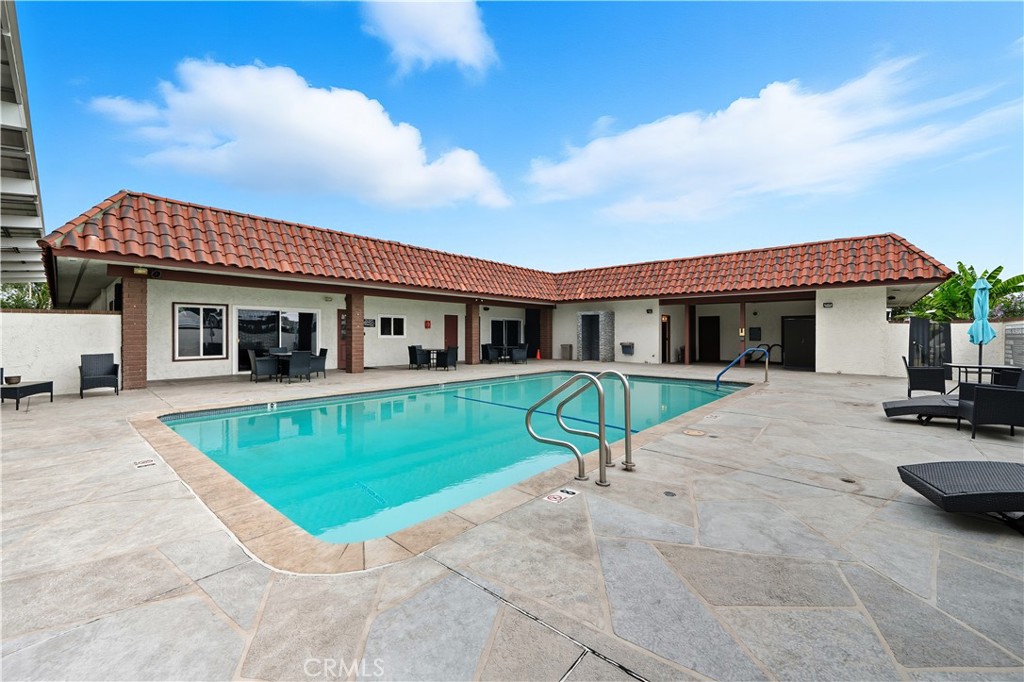 9800 Base Line Road, Unit 79 Rancho Cucamonga, CA 91701 - Photo 26 of 31 a view of house that has a yard