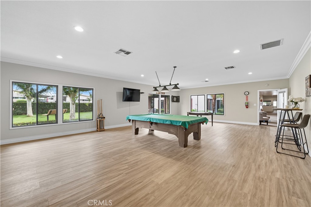 9800 Base Line Road, Unit 79 Rancho Cucamonga, CA 91701 - Photo 31 of 31 a dining room with furniture and wooden floor