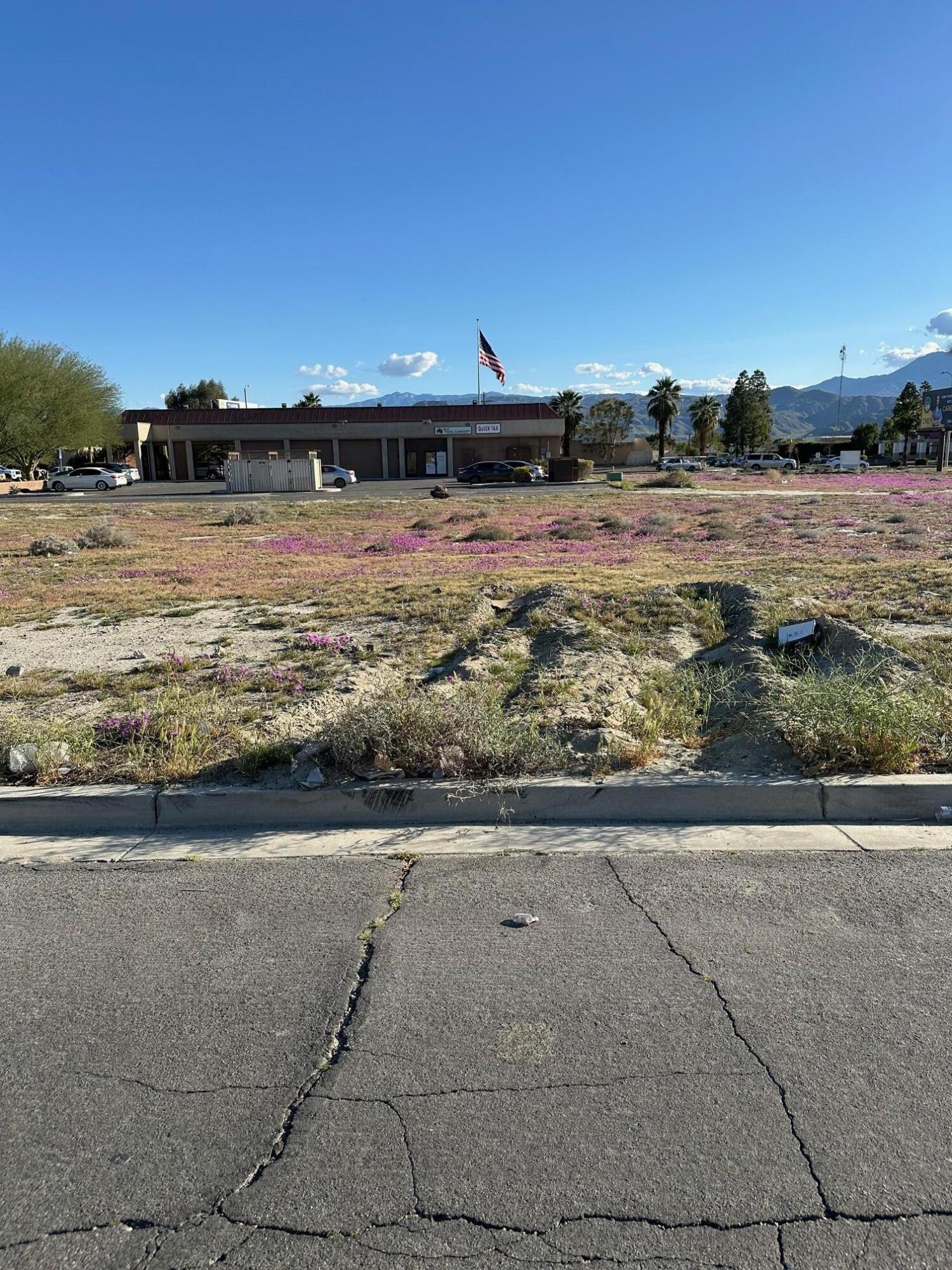 Lot 50 Aliso Road Cathedral City, CA 92234 - Photo 2 of 3 a view of a lake with beach