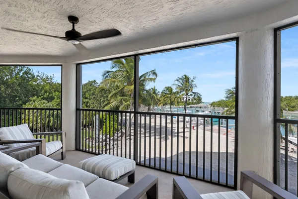 a balcony with furniture