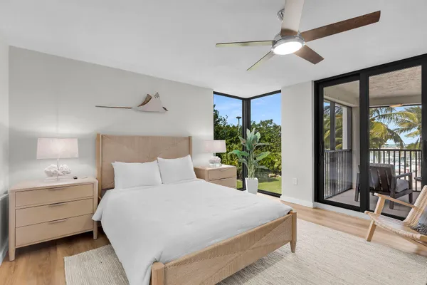 a bathroom with a granite countertop double vanity sinks and a mirror