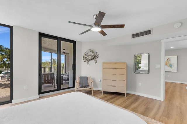 a bathroom with a double vanity sink mirror and shower