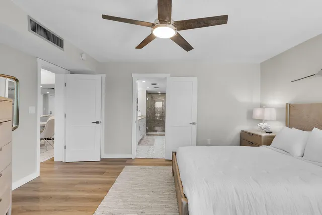 a bathroom with a shower and a toilet