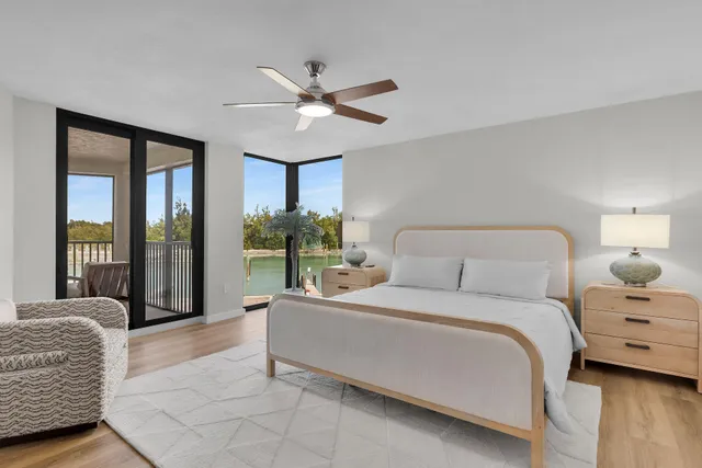 a bedroom with a bed and cabinets