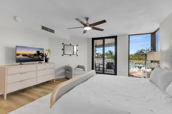 a spacious bathroom with a double vanity sink and a mirror