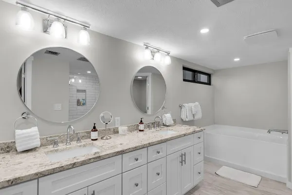 a view of a lake with a wooden deck and a lake view