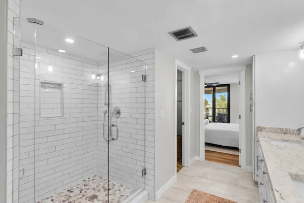 an aerial view of a house with a swimming pool