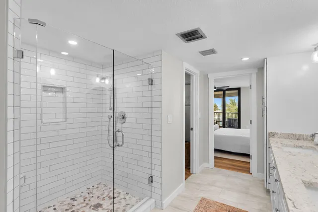 an aerial view of a house with a swimming pool