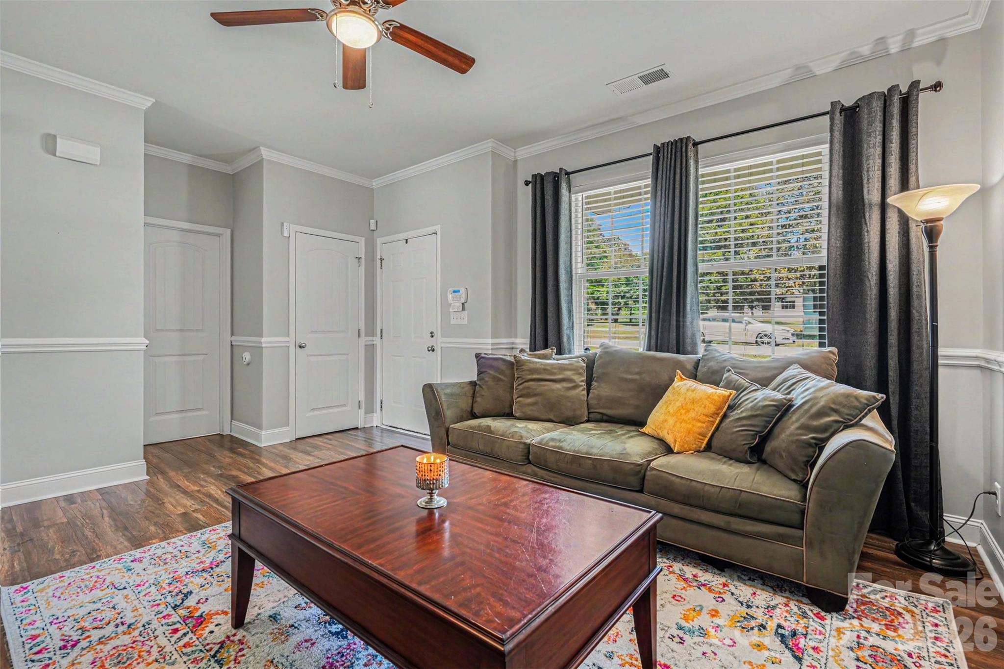 1610 Walter Hasty Road Monroe, NC 28110 - Photo 5 of 32 a living room with furniture and a rug