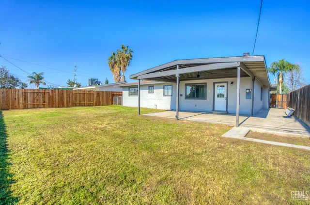 a view of a house with a swimming pool