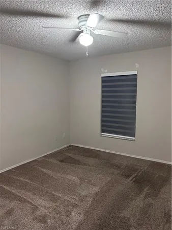 a view of a room that has a window in it