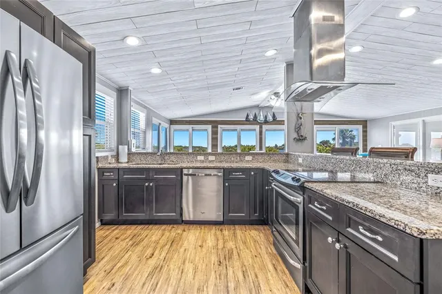 a view of a lake with a house in the background