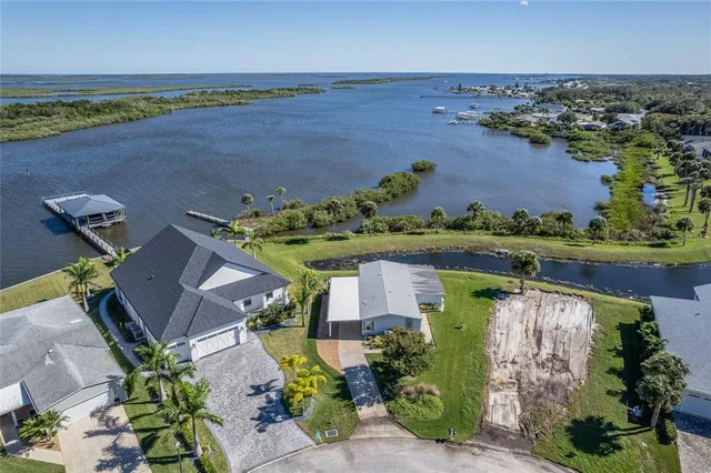 a view of a swimming pool with a yard
