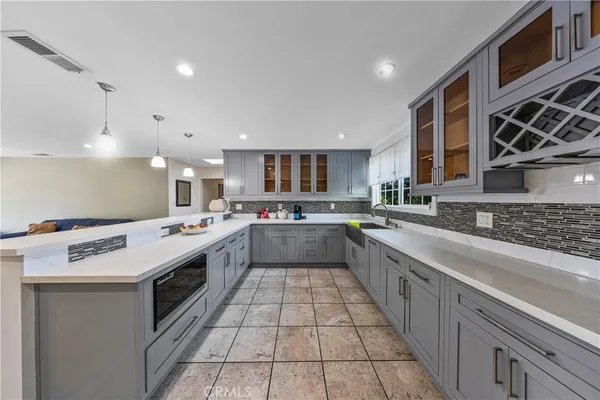 a view of livingroom with kitchen and furniture