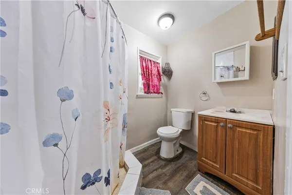 a bedroom with a bed and a cabinets
