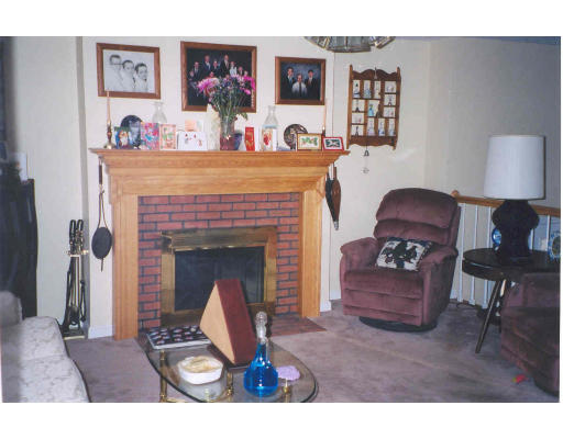 10 Indian Point Road Webster, MA 01570 - Photo 4 of 5 a living room with furniture and a fireplace