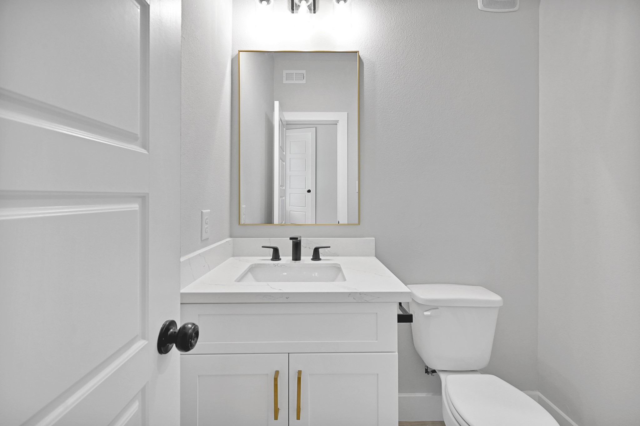 3312 Bacchus Street, Unit A Houston, TX 77022 - Photo 12 of 23 Half bathroom/powder room perfect for guests!