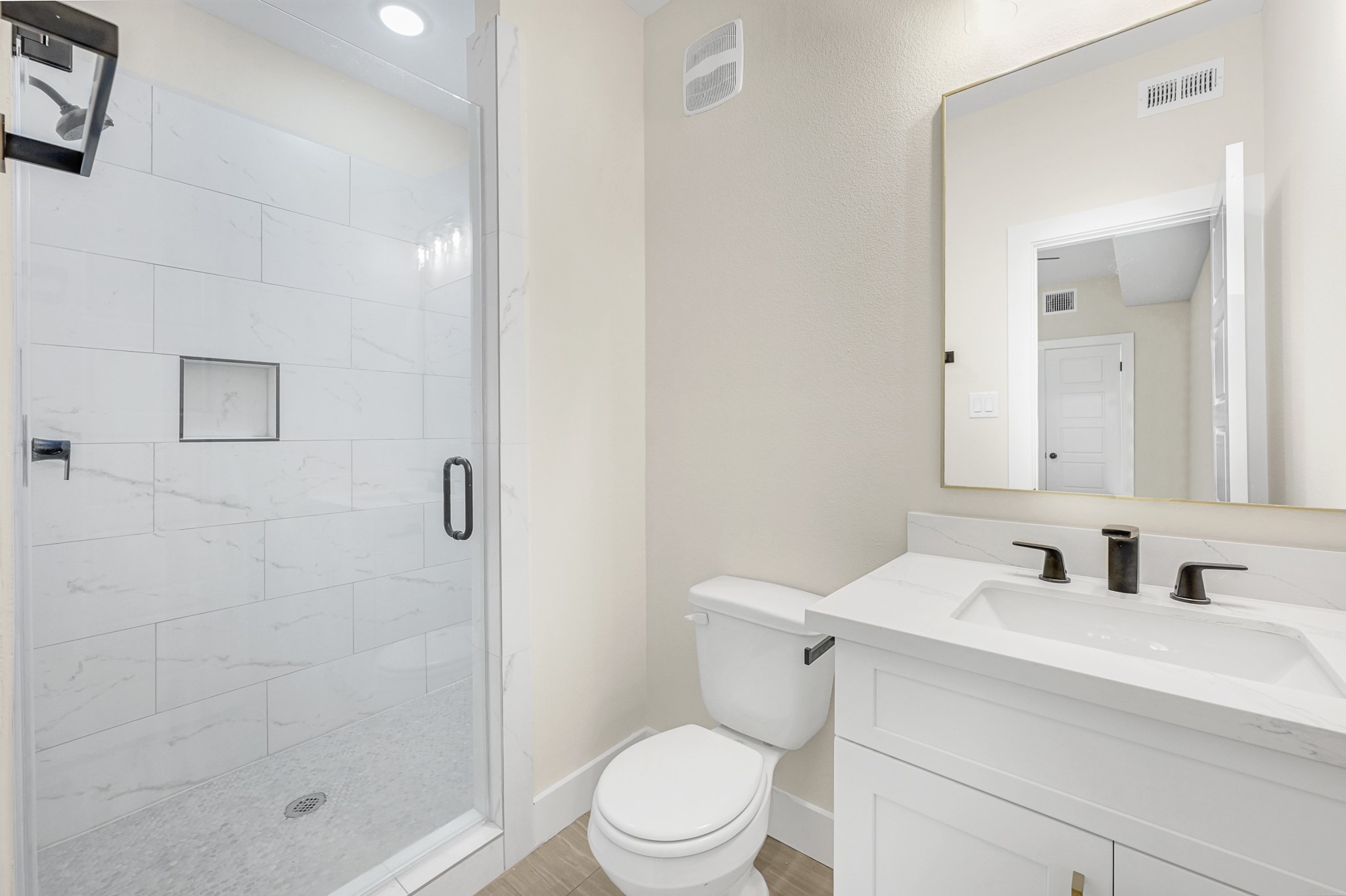 3312 Bacchus Street, Unit A Houston, TX 77022 - Photo 4 of 23 Gorgeous bathroom with standing shower #1