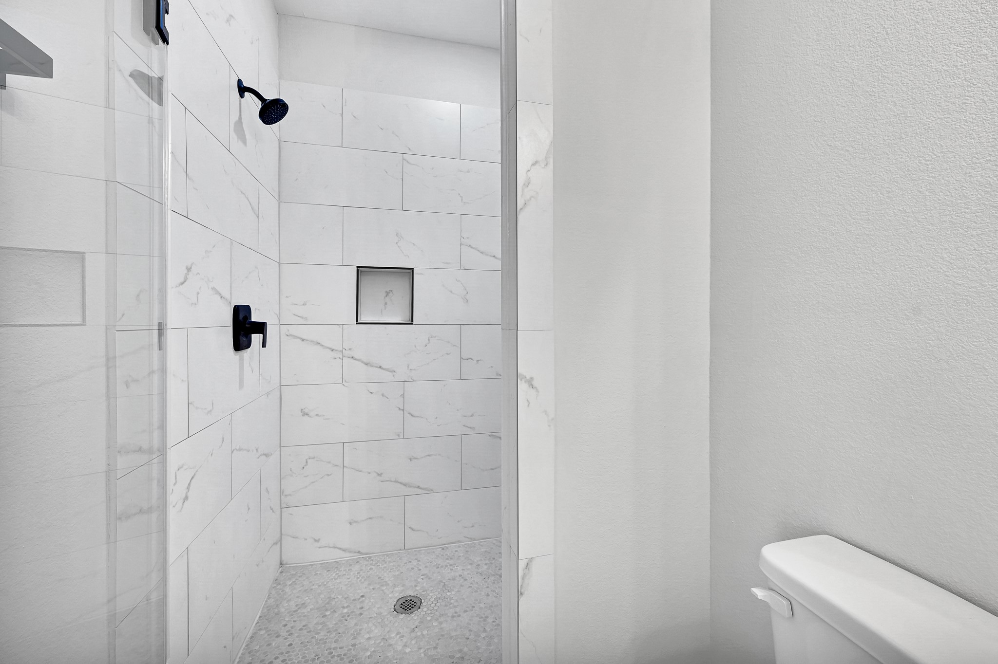 3312 Bacchus Street, Unit A Houston, TX 77022 - Photo 5 of 23 Gorgeous bathroom with standing shower #2